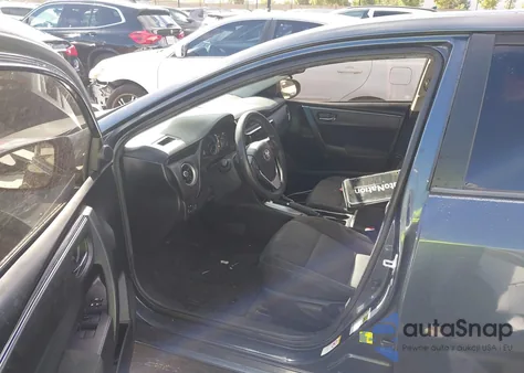 2018 Toyota Corolla Le from USA, damaged, VIN 5YFBURHE8JP852623